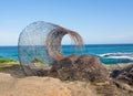 `Wave within` is a sculptural artwork by Sandra Pitkin at the Sculpture by the Sea annual events free to the public at Bondi.